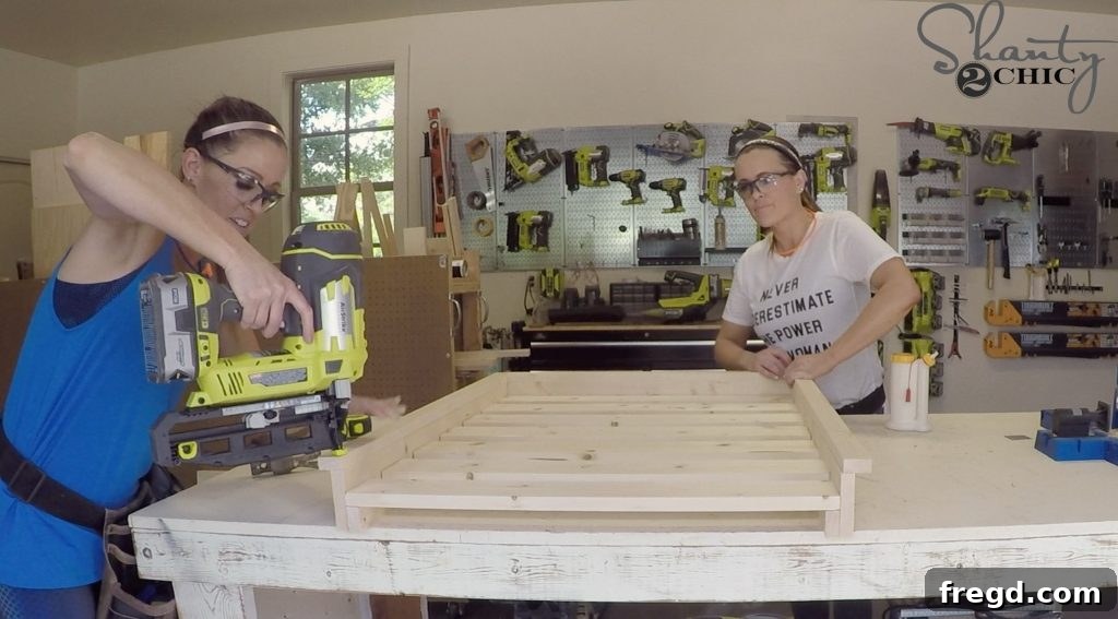 Securing the mattress slats to the cleats within the dog bed frame