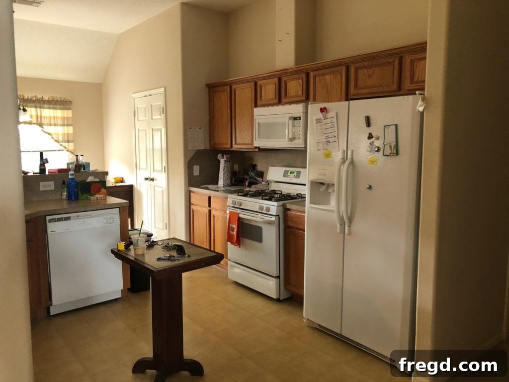 Leasha's Builder-Grade Kitchen Cabinets Before DIY Extension