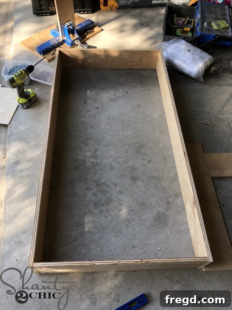 Assembling the taller cabinet shelf boxes for additional storage