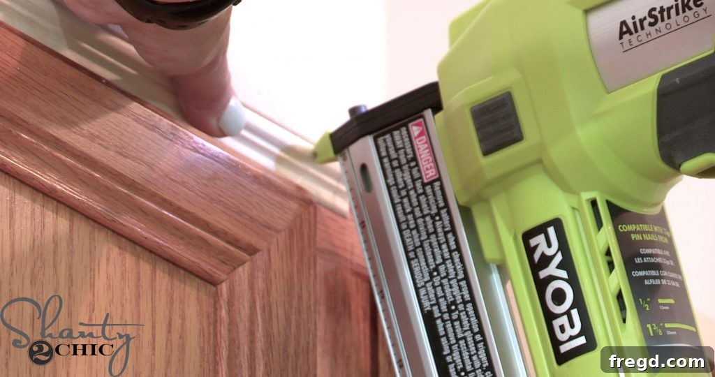 Adding small trim to cover where old crown molding was removed
