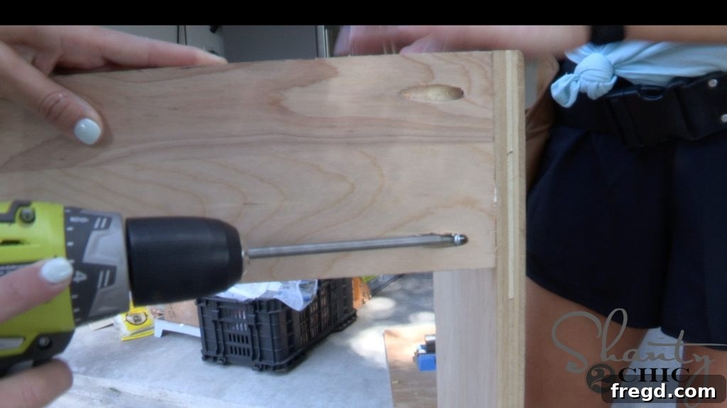 Attaching support pieces to the hood cabinet sides with pocket holes