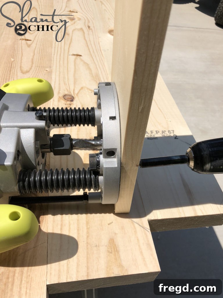 The process of attaching the plunge router to the jig board using machine screws and nuts from the underside