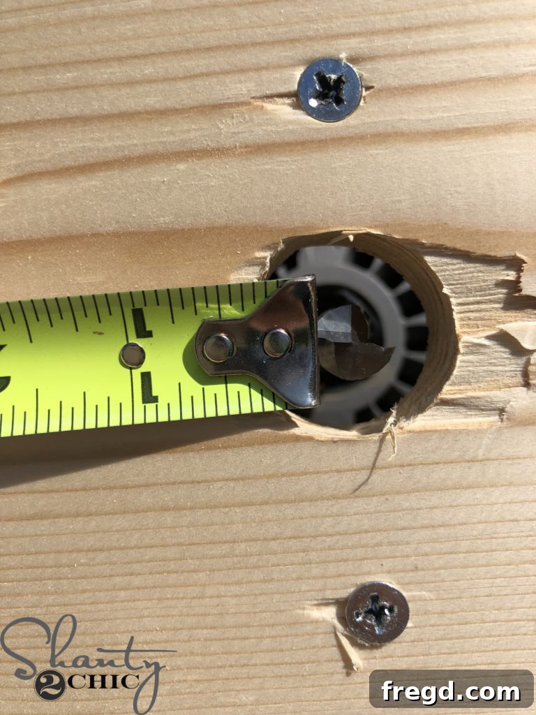 Measuring the precise distance from the router bit to the pivot point on the jig arm