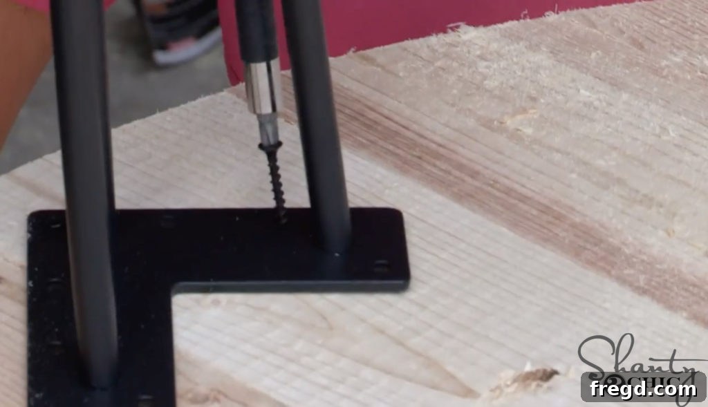 Dynamic shot of a plunge router with a homemade jig cutting a perfectly round tabletop