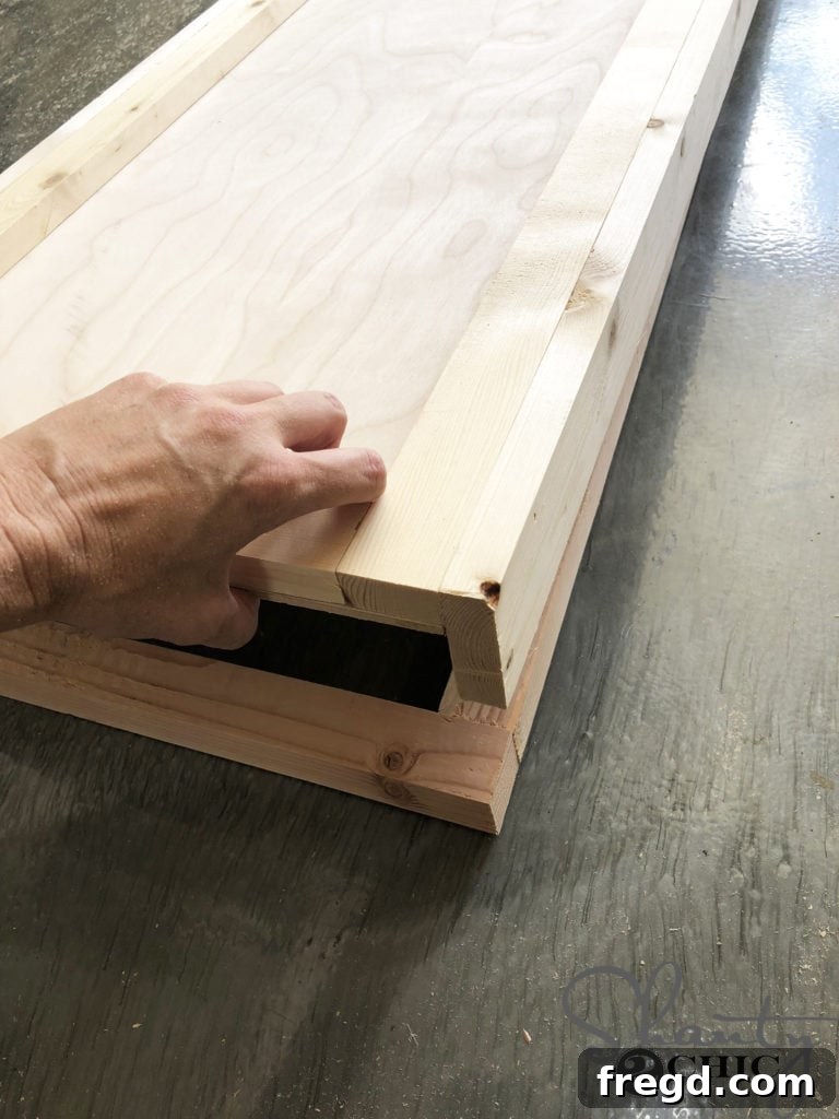 Centering and attaching the middle support to the ladder frame for added stability