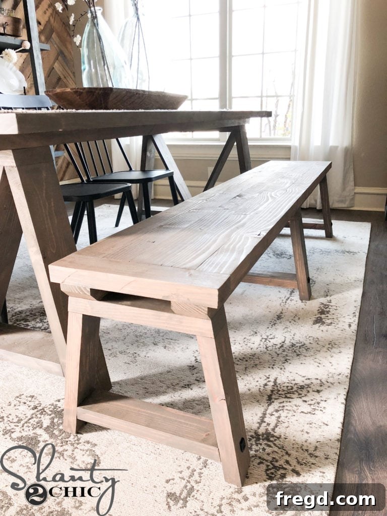 Finished DIY Fancy V Dining Bench with beautiful stain and decor