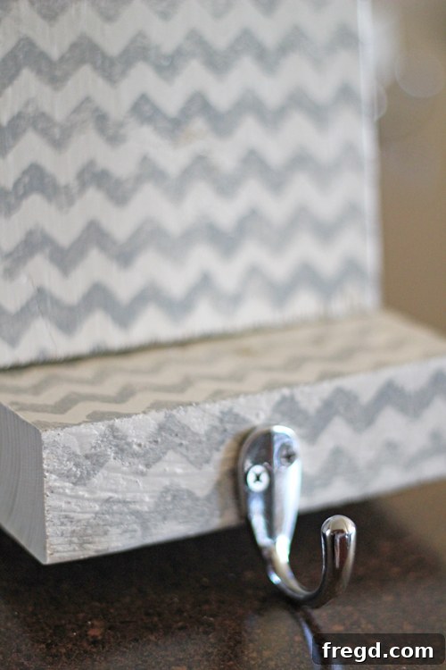 Attaching the Hook Screw in the stocking hook into the center of the bottom block