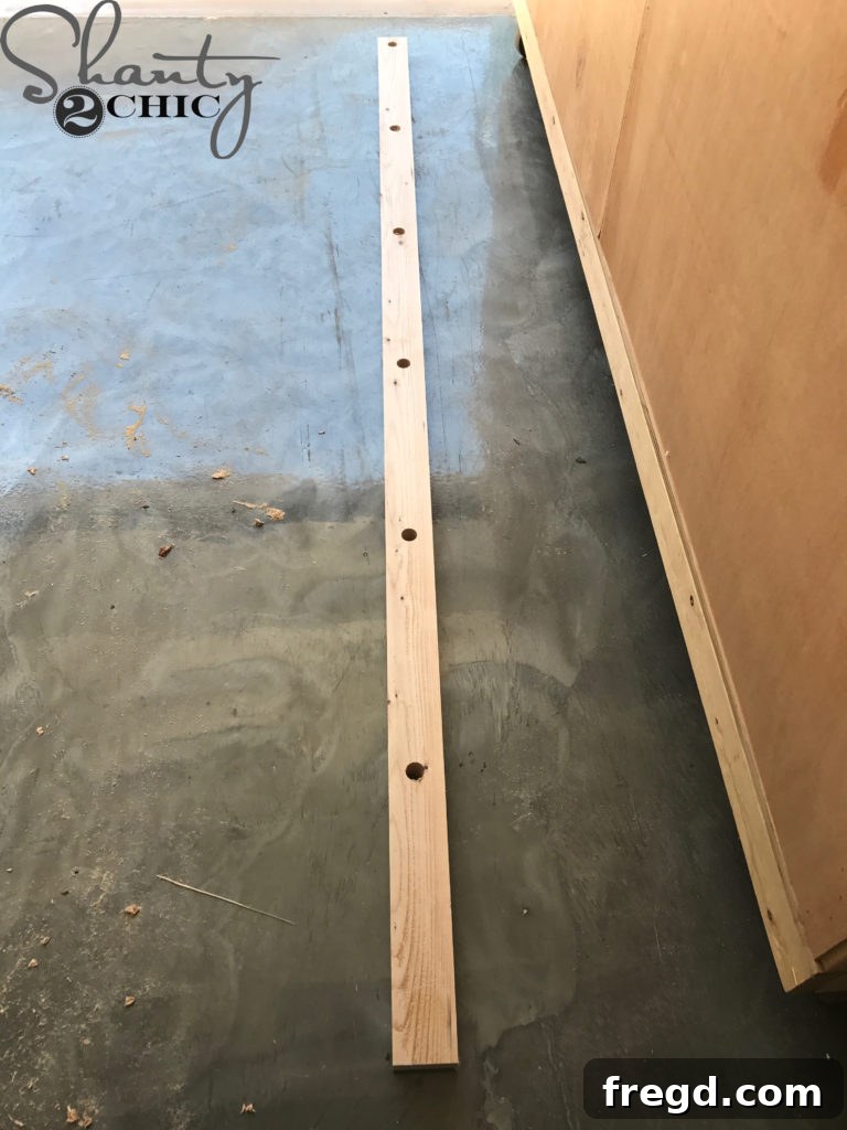Craft Your Own Modern Farmhouse Dish Display 5 Drilling holes into a ladder rail with a Forstner bit