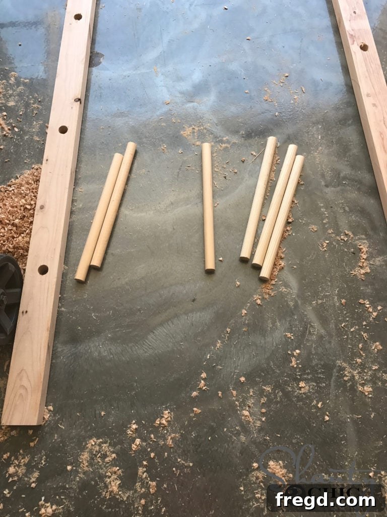 Craft Your Own Modern Farmhouse Dish Display 6 A completed ladder rail with drilled holes ready for assembly