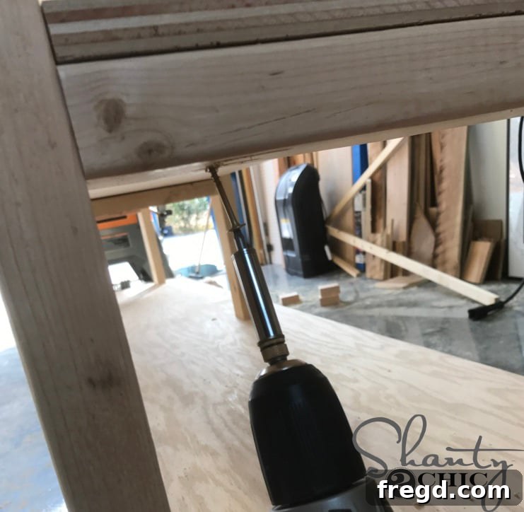 Securing Lumber Cart Shelves with Wood Screws and Glue for Strength