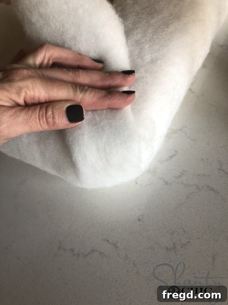 Applying Wood Stain to DIY Ottoman and Trunk Before Upholstery