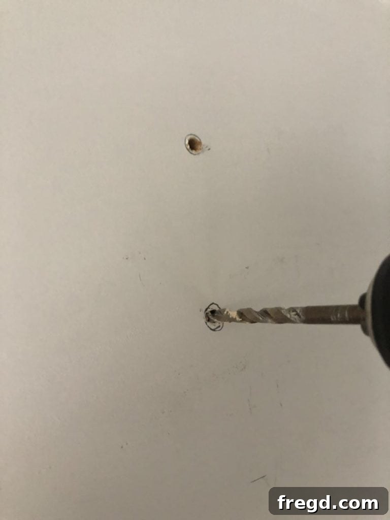 Marking and pre-drilling for bypass barn door hardware