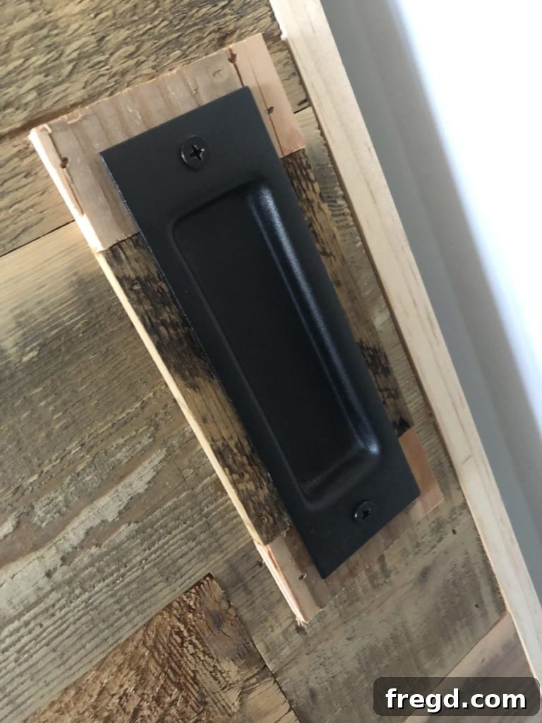Attaching rustic door pulls to the bypass closet doors