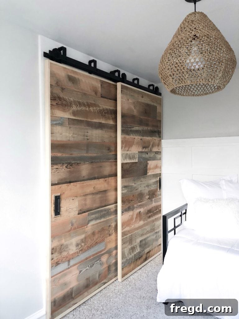 Interior view of modern farmhouse closet with sliding doors