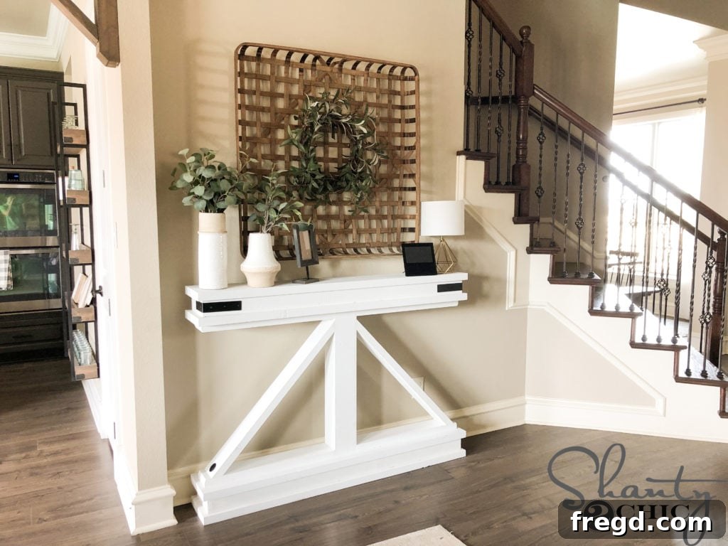 Another perspective of the rustic yet elegant DIY Narrow Console Table, featuring its detailed design and stylish decoration in a home setting.