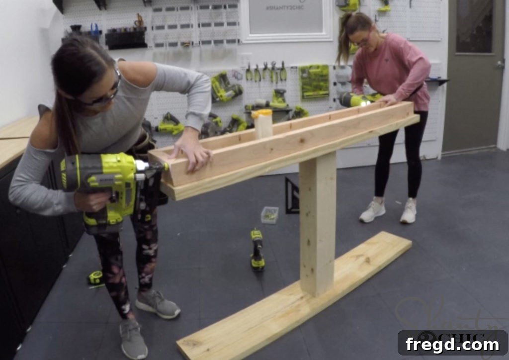 Two apron pieces securely joined together with wood glue and 2 1/2-inch finish nails, forming a complete apron section.
