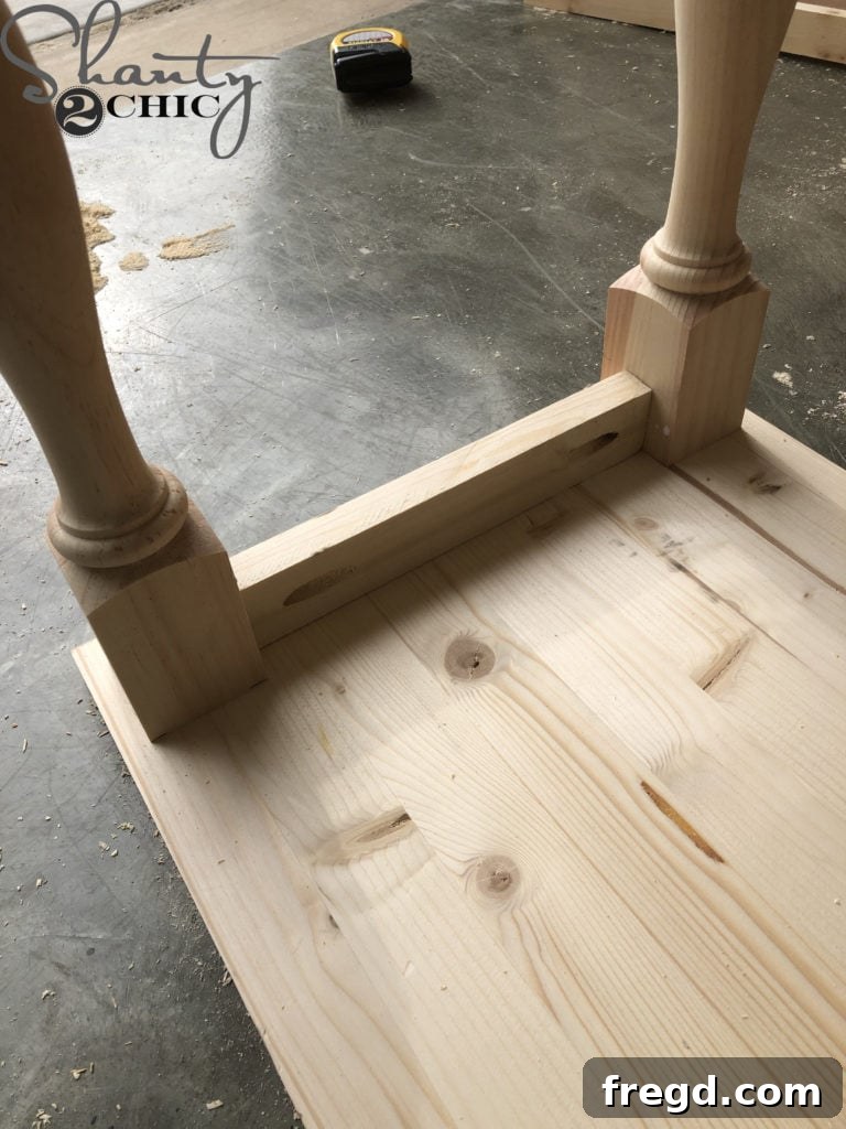 Attaching the apron to the peninsula legs with pocket hole screws