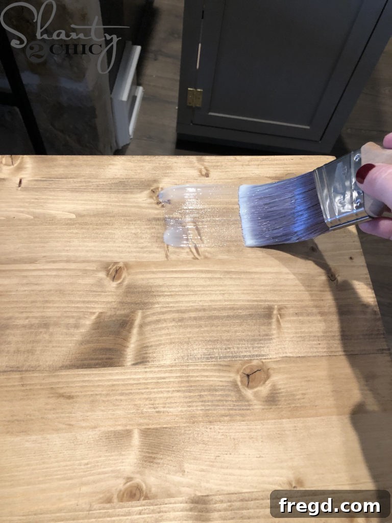 Applying a protective finish to the stained countertop