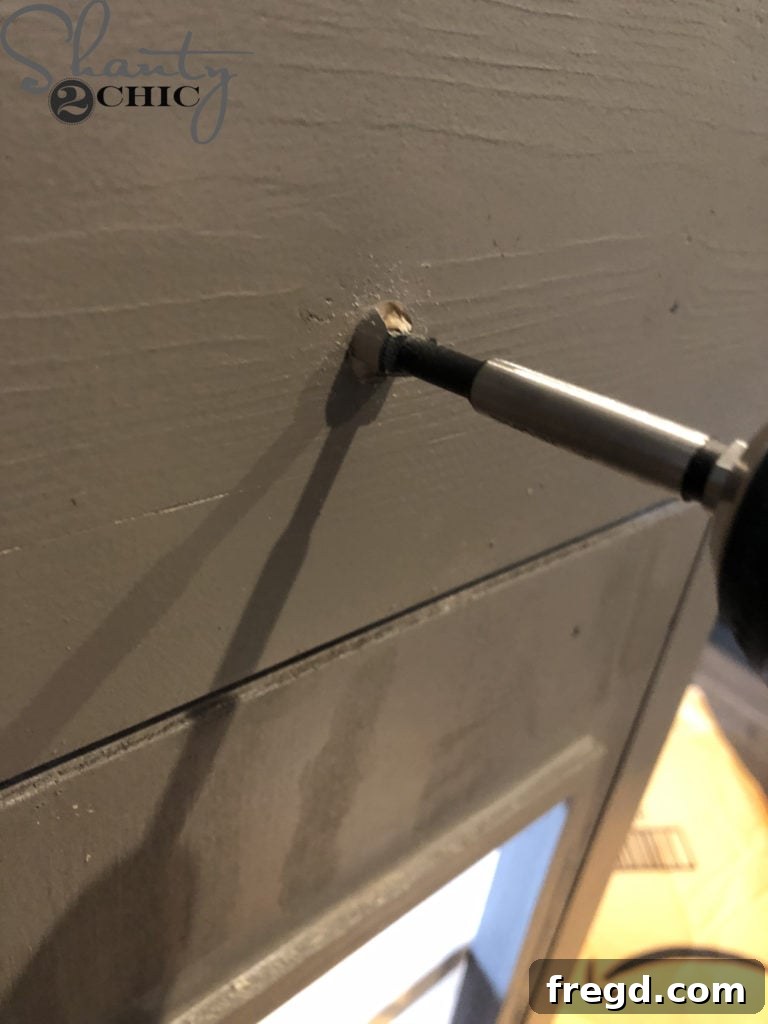 Drilling holes for the functional play kitchen knobs