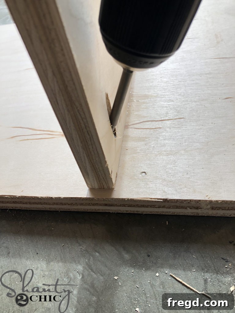 Attaching shelves to the sink side panel with pocket hole screws