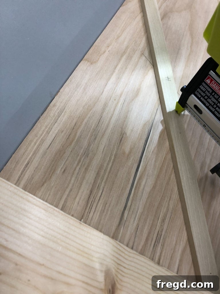 Attaching decorative diamond trim to the dresser side panels