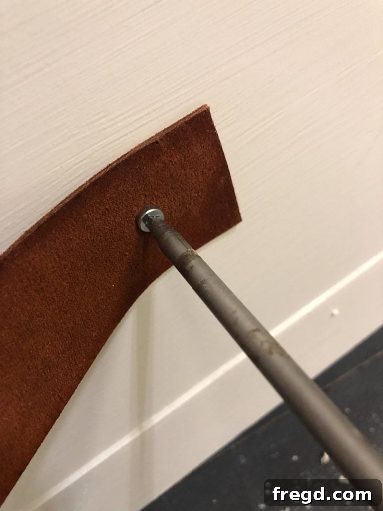 Attaching the leather pulls to the drawer faces with Kreg screws