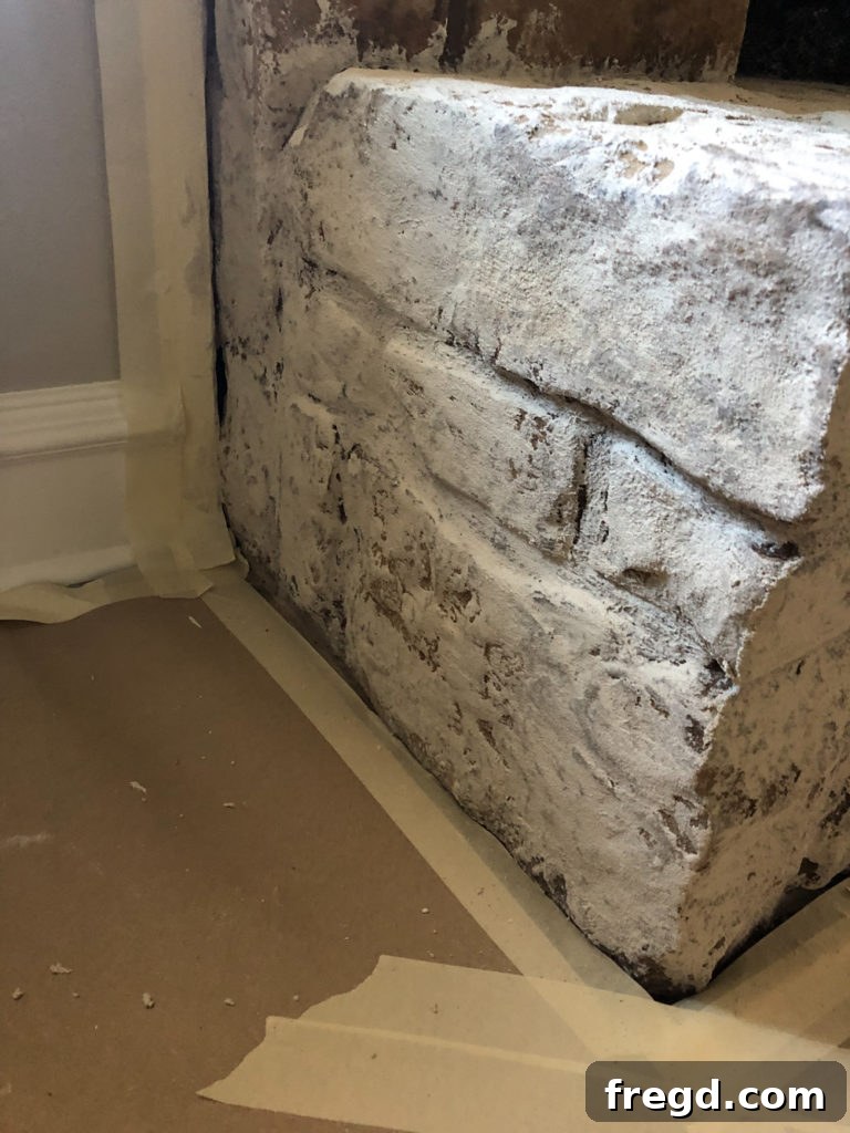 Progress shot of German Schmear on fireplace hearth
