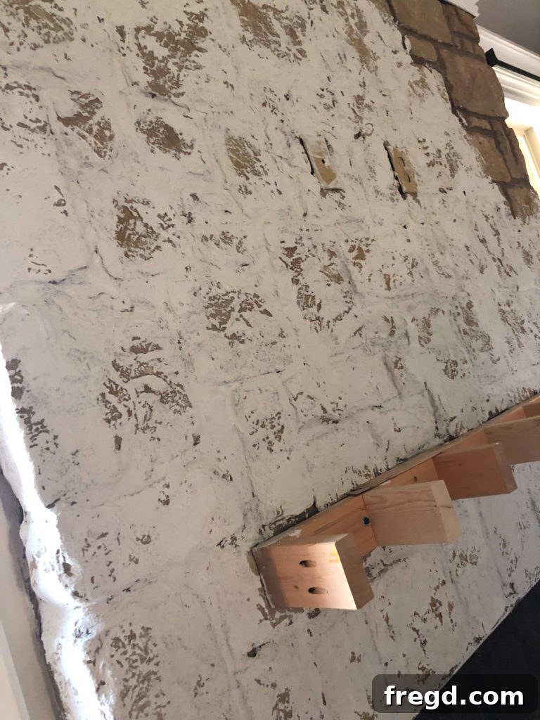 Applying German Schmear to the full fireplace facade