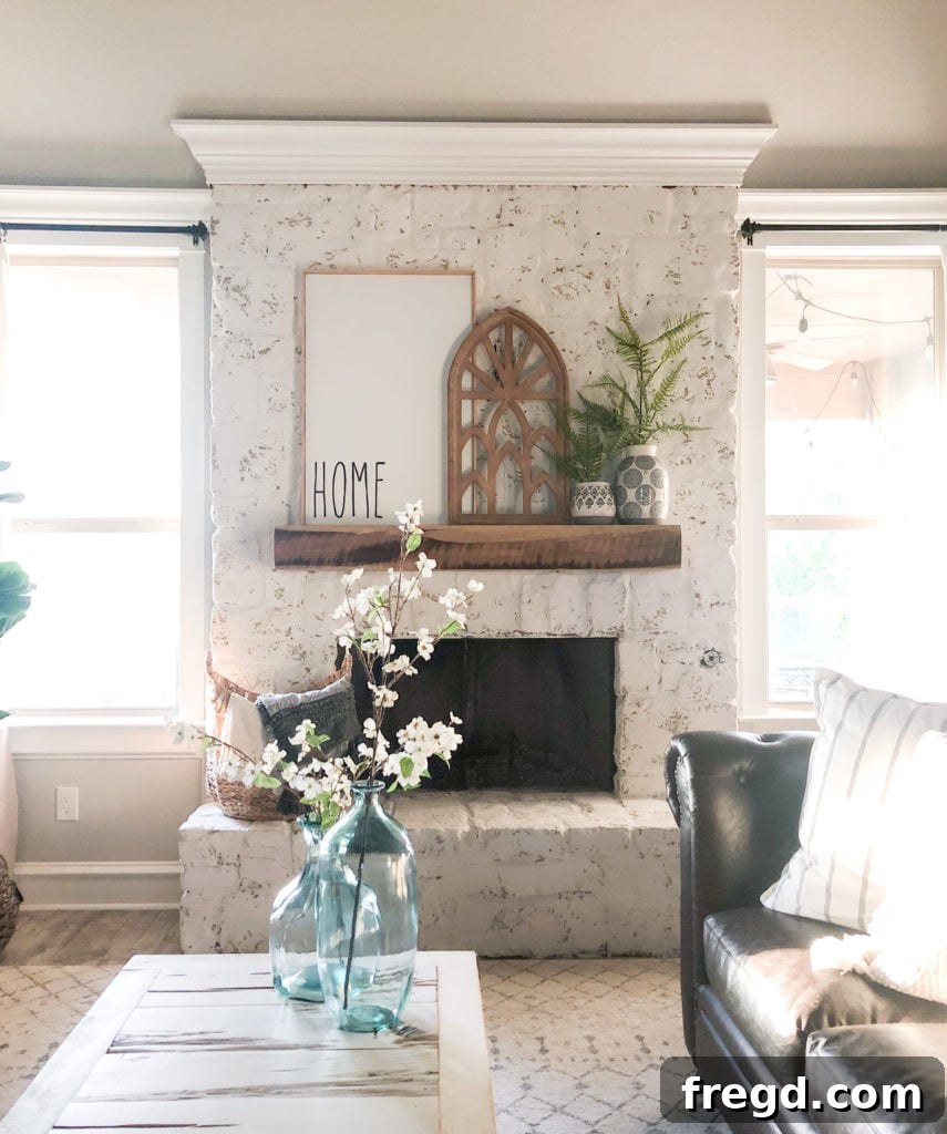 Full view of brightened living room with transformed fireplace