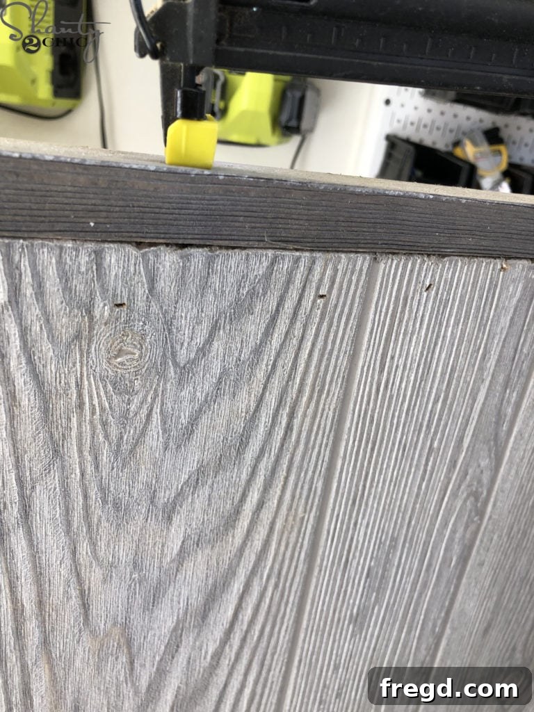 Attaching barn door trim with brad nails and wood glue