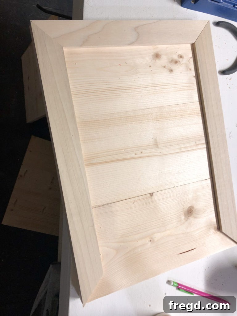 Attaching horizontal trim to complete frame