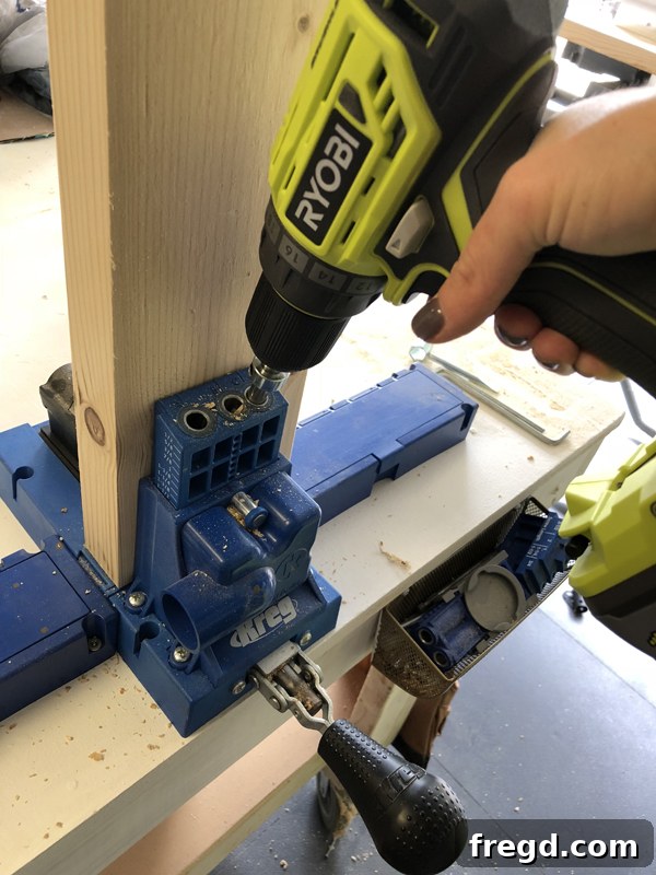 Cutting side rails and cleats to size for the bed frame.