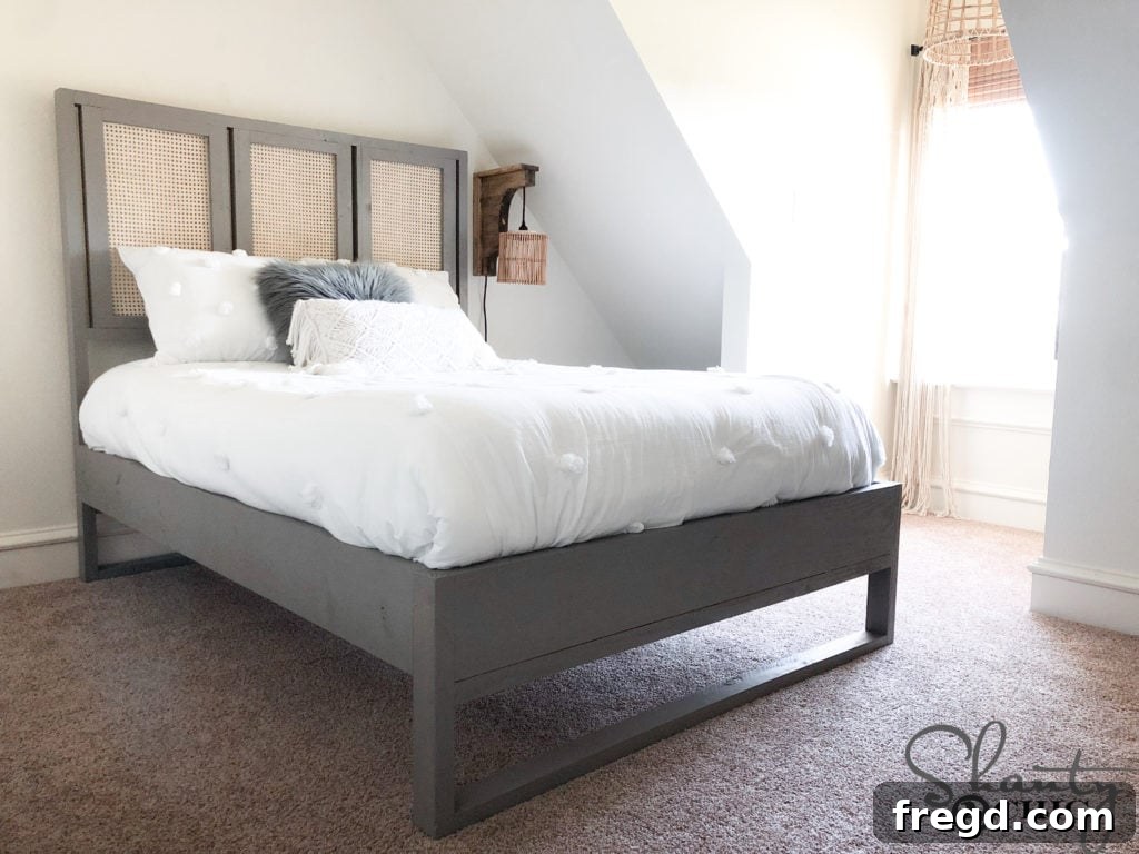 Finished DIY Cane Bed painted with Valspar Seine.