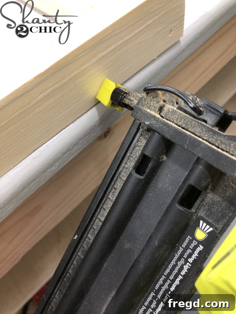 Assembling the side frame pieces with a brad nailer and wood glue.