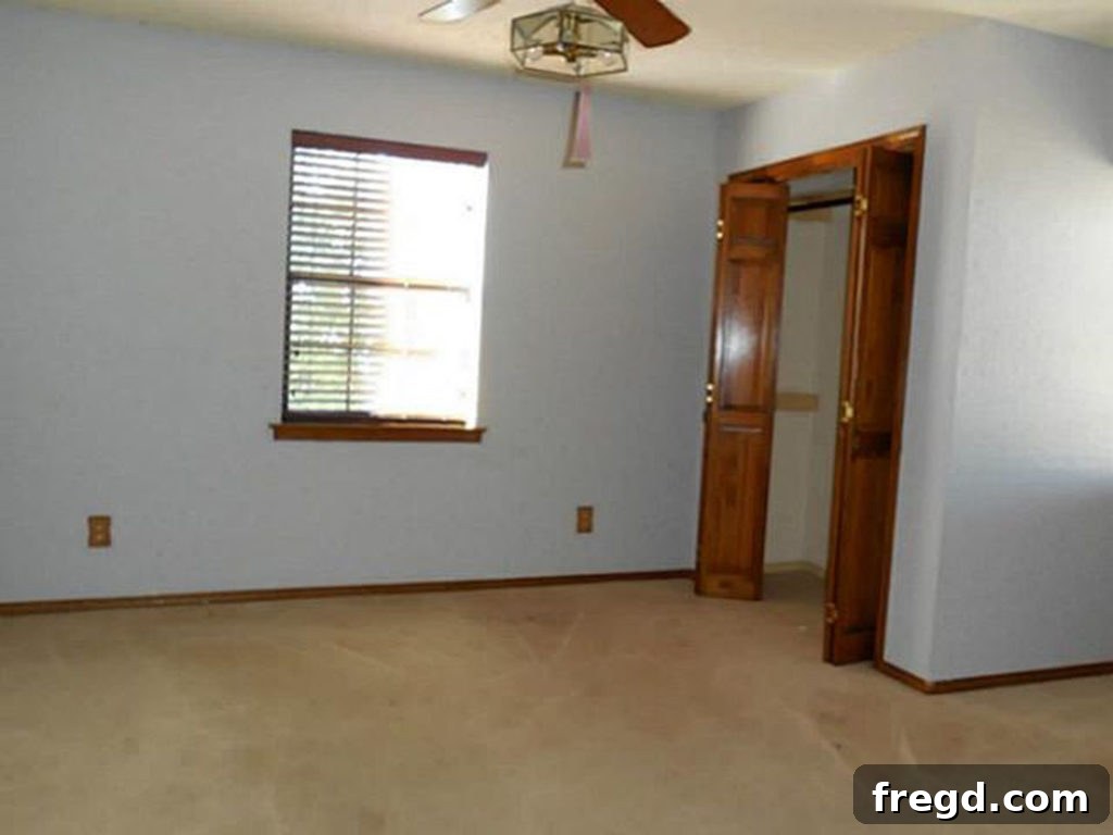 Flip house back upstairs secondary bedroom, part of the existing structure