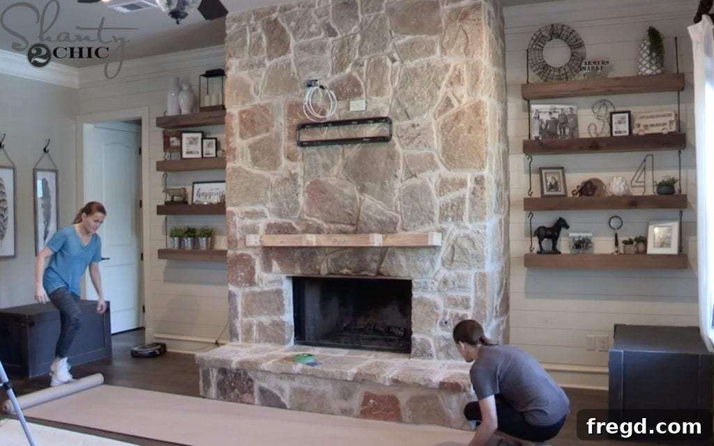 Rolling out builder's paper to protect the floor around the fireplace