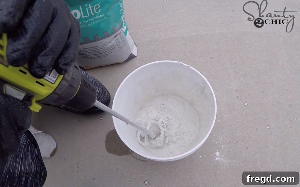 Mixing mortar and water with a drill attachment