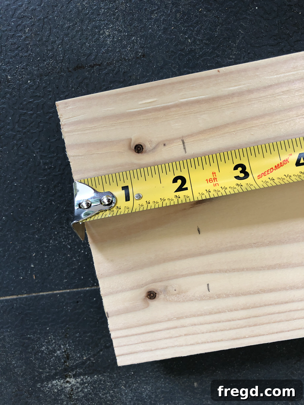 Build Your Own Faux Drawer Console Table 15 Marking 2 inches from the base of the leg for accurate shelf support alignment.