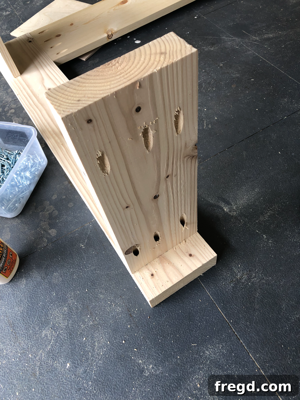 Build Your Own Faux Drawer Console Table 18 Shelf supports securely attached to the leg assembly, forming the lower frame.