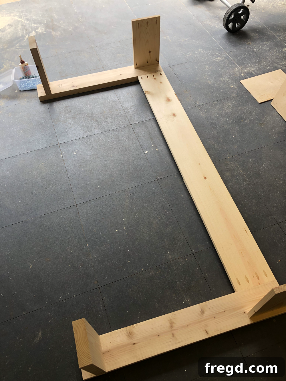Build Your Own Faux Drawer Console Table 23 The leg assembly with a shorter apron attached, preparing for the other side connection.
