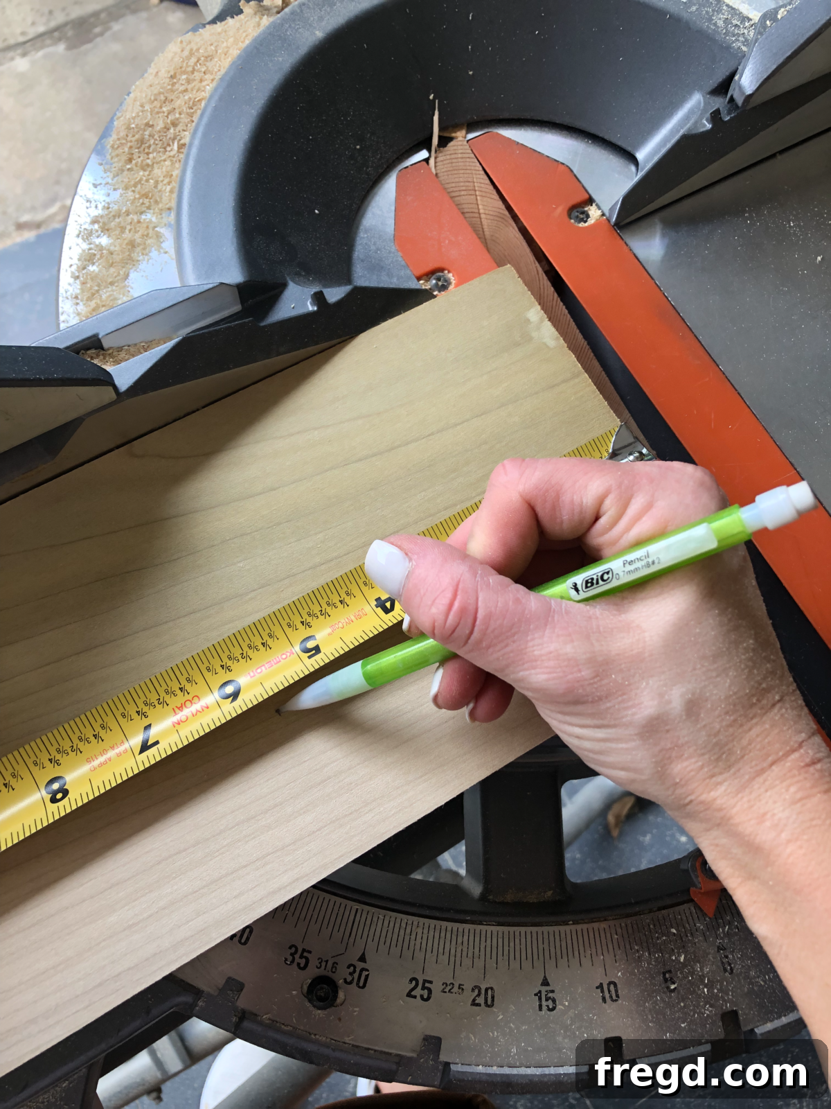 Build Your Own Faux Drawer Console Table 5 Measuring and cutting craft boards for faux drawer faces with precision.