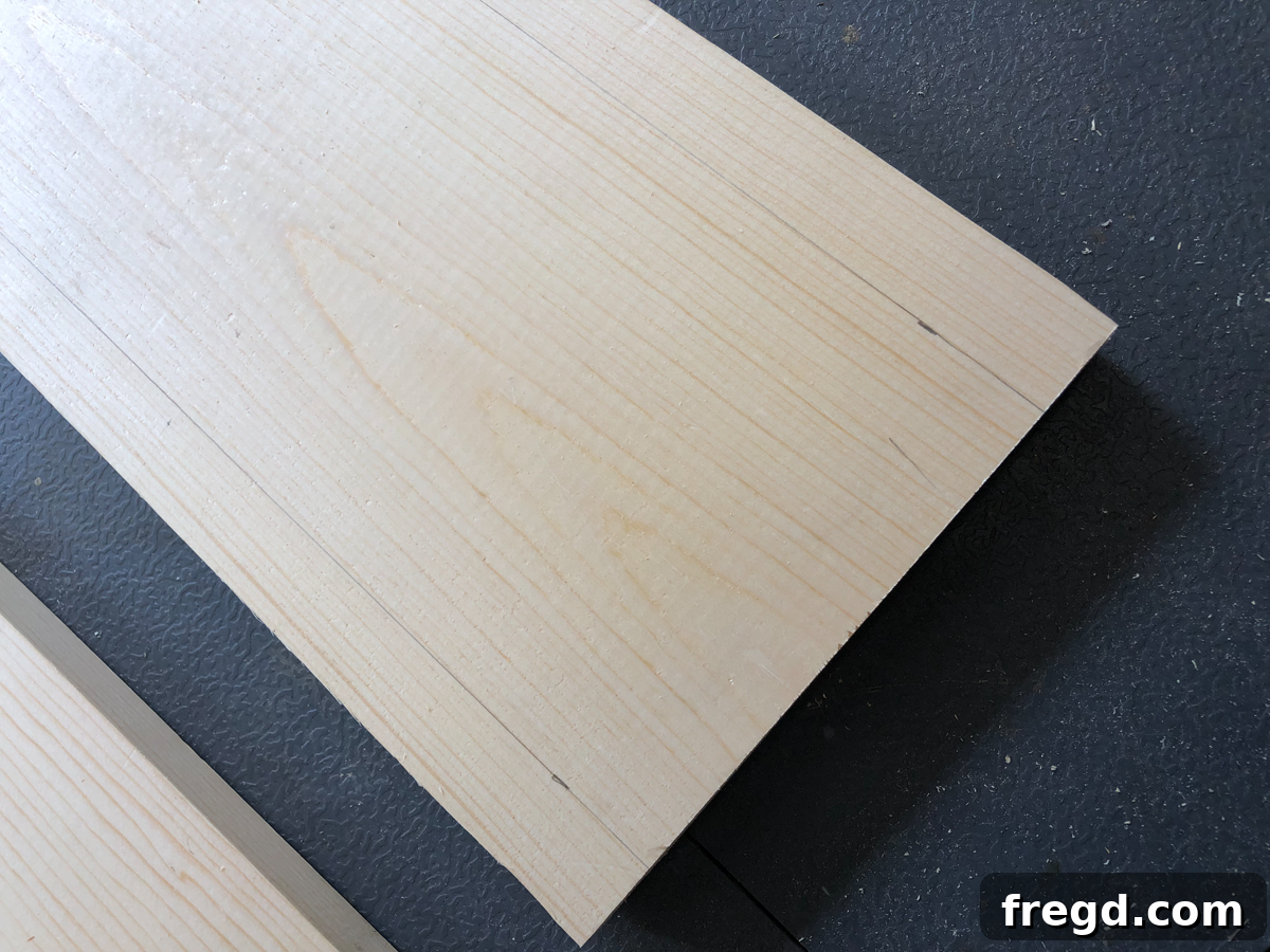 Build Your Own Faux Drawer Console Table 7 Close-up of marked lines on a wooden board, indicating placement guides.