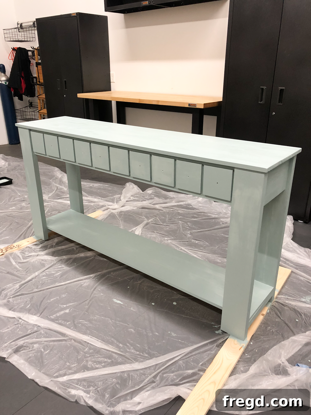 Console table drying after the first coat of paint
