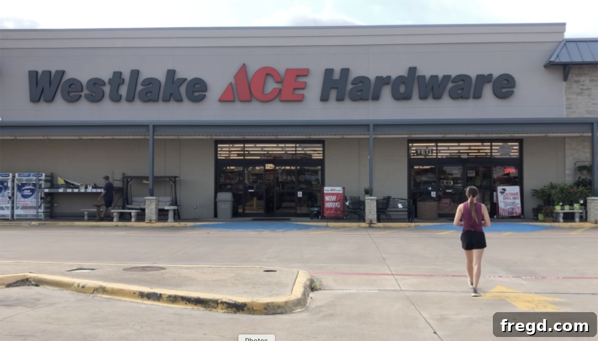 Interior shot of an Ace Hardware store, focusing on the paint aisle
