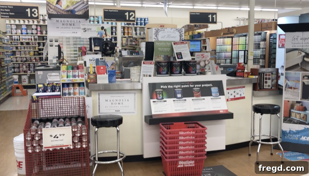 Well-stocked paint section at Ace Hardware with various brands
