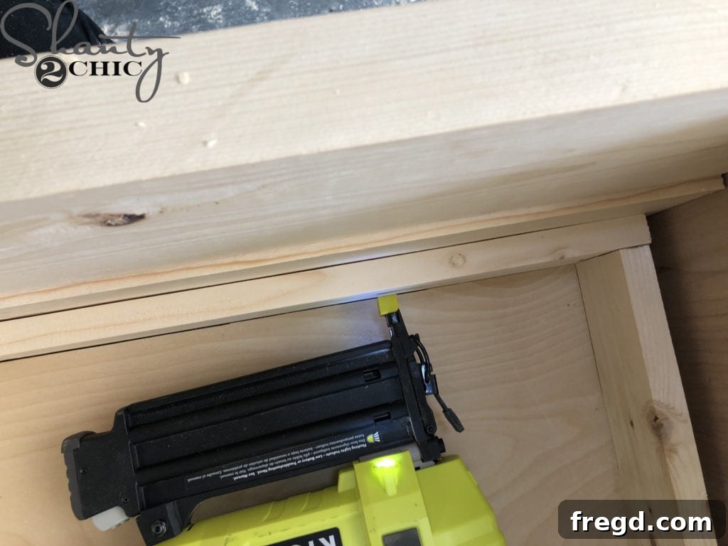 DIY Rustic Double Sink Bathroom Vanity with Barn Door Storage 26 Attaching the drawer faces to the drawer box