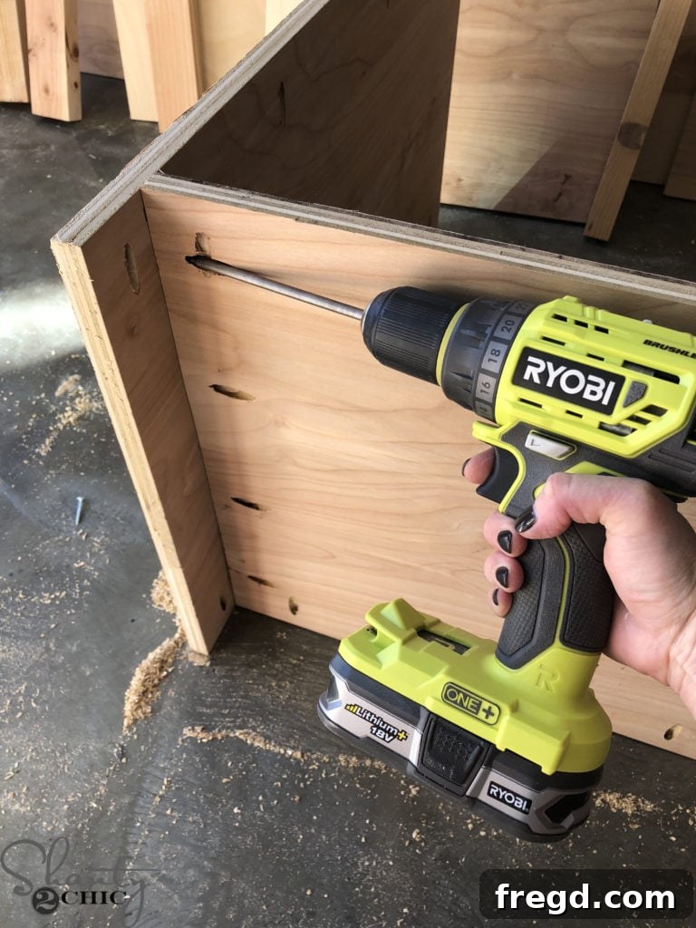 DIY Rustic Double Sink Bathroom Vanity with Barn Door Storage 4 Attaching Side Panels to Vanity Base