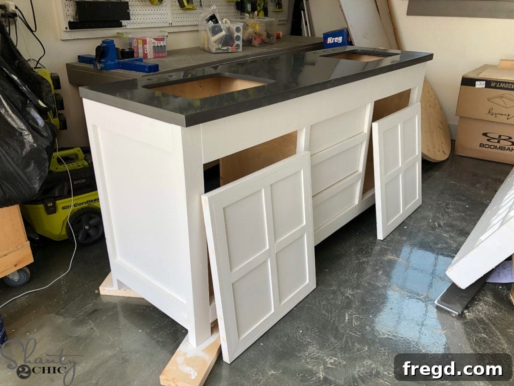 DIY Rustic Double Sink Bathroom Vanity with Barn Door Storage 35 How to build a barn door bathroom vanity - finishing touches
