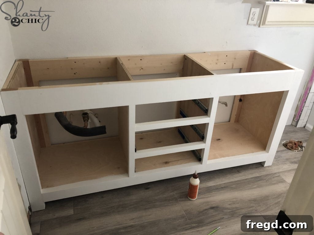 DIY Rustic Double Sink Bathroom Vanity with Barn Door Storage 49 Installing the bathroom vanity in its final position
