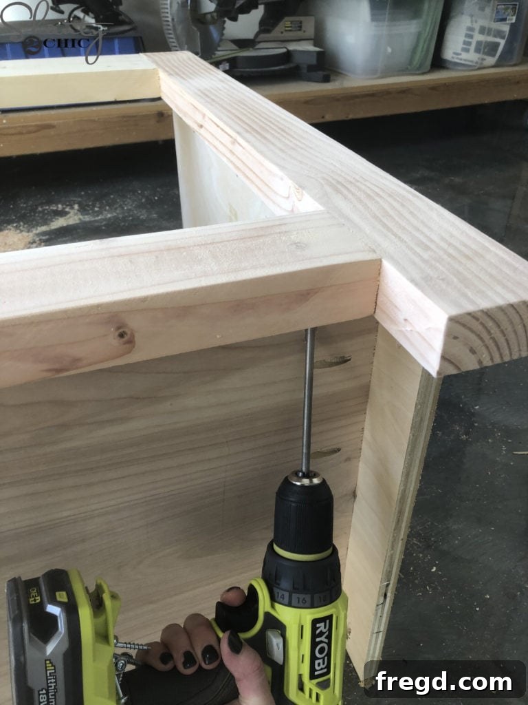 DIY Rustic Double Sink Bathroom Vanity with Barn Door Storage 10 Attaching the Face Frame to the DIY Bathroom Vanity